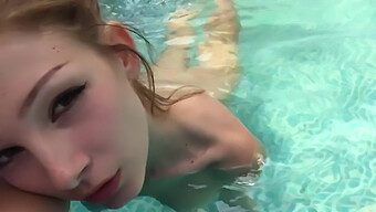 Swimming In Ecstasy: A Girl Pleasuring Herself By The Pool